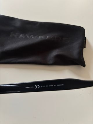 Hawkers Gafas Sol - Negras/Moradas