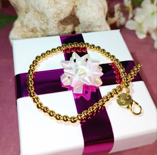 Pulsera bolitas chapada en oro 18K