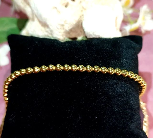 Pulsera bolitas chapada en oro 18K