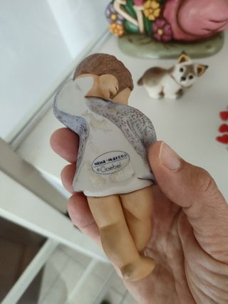 Statuina bimba Goebel: flauto