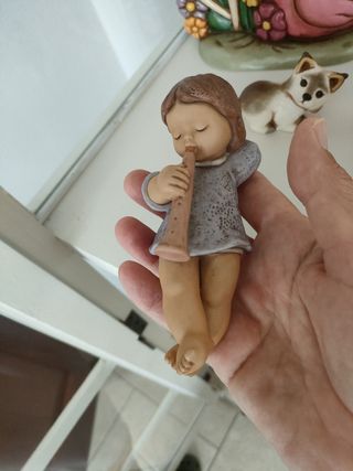 Statuina bimba Goebel: flauto
