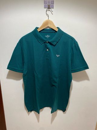 Lote 2 polos verde azulado y negro de Green Coast