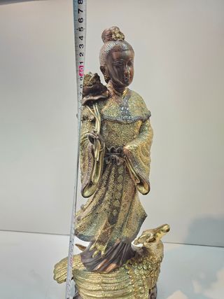 Escultura de bronce.