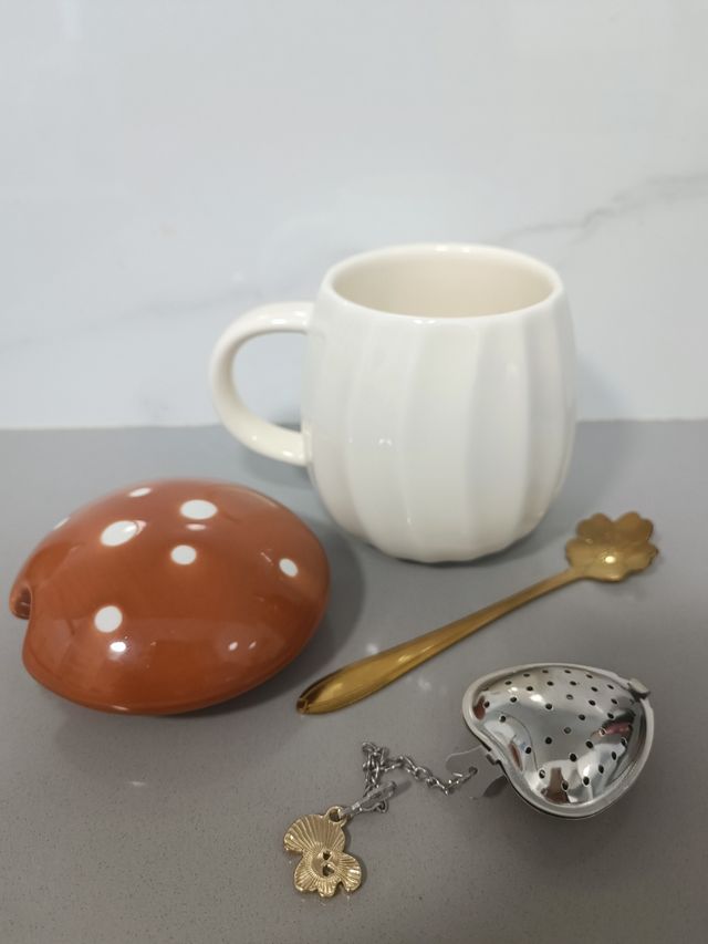 Taza seta e infusor: ¡Sin usar!