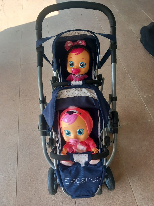 Carrito gemelar perfecto estado + dos muñecos 