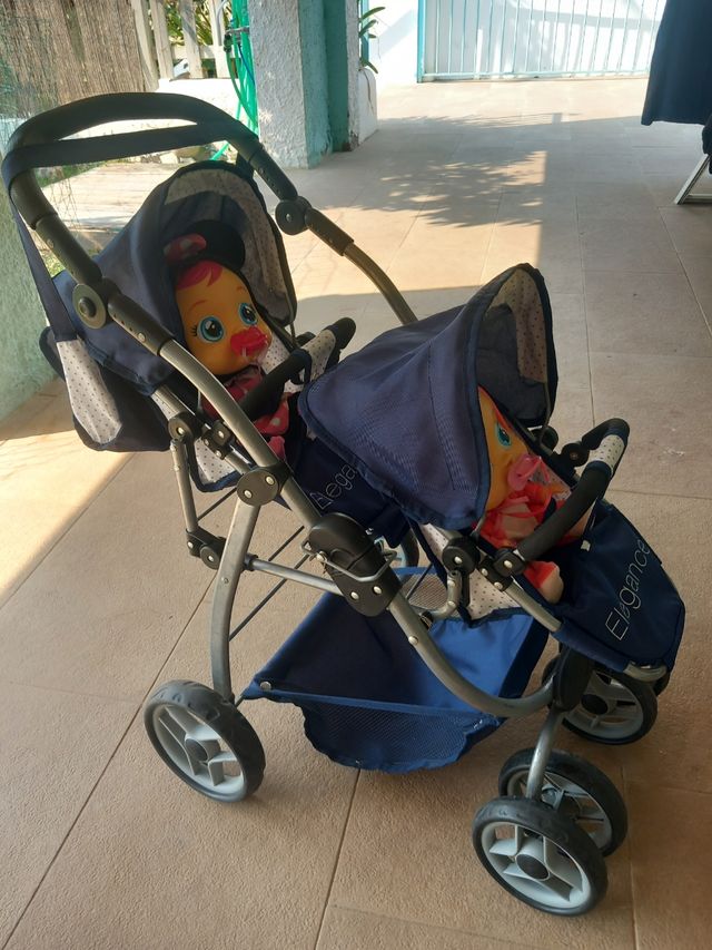 Carrito gemelar perfecto estado + dos muñecos 