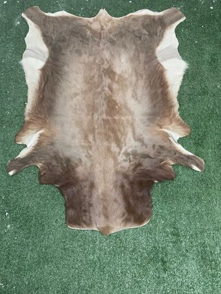 Alfombra piel marrón