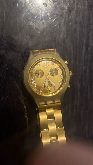 Reloj Swatch Irony Diaphane dorado