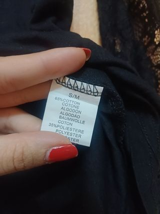 Maglia in pizzo e pelle,maniche in pizzo  elegante