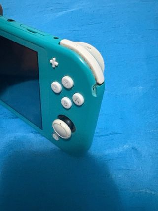Nintendo Switch Lite Verde + FIFA 22, 23 y 24