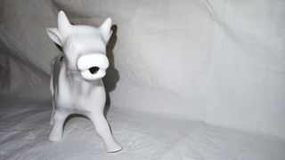 Lattiera mucca bianca in porcellana.