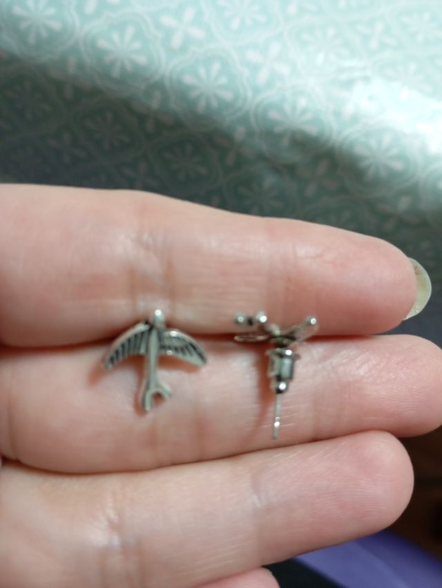 Pendientes pájaro acero plata