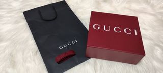 Caja y bolsa Gucci