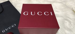 Caja y bolsa Gucci