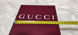 Caja y bolsa Gucci