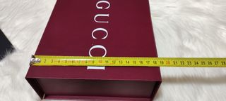Caja y bolsa Gucci