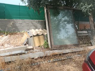 Materiales construcción: Tejas, vigas, ventanas