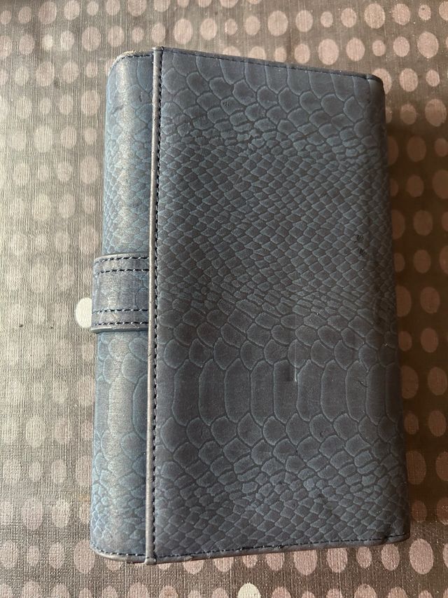 Cartera Desigual azul.