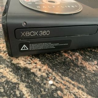consola Xbox 360 negra + juego Half-Life 2