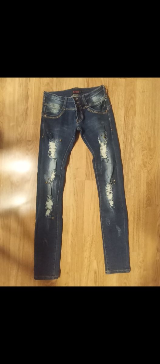 Vaqueros rotos ajustados azules