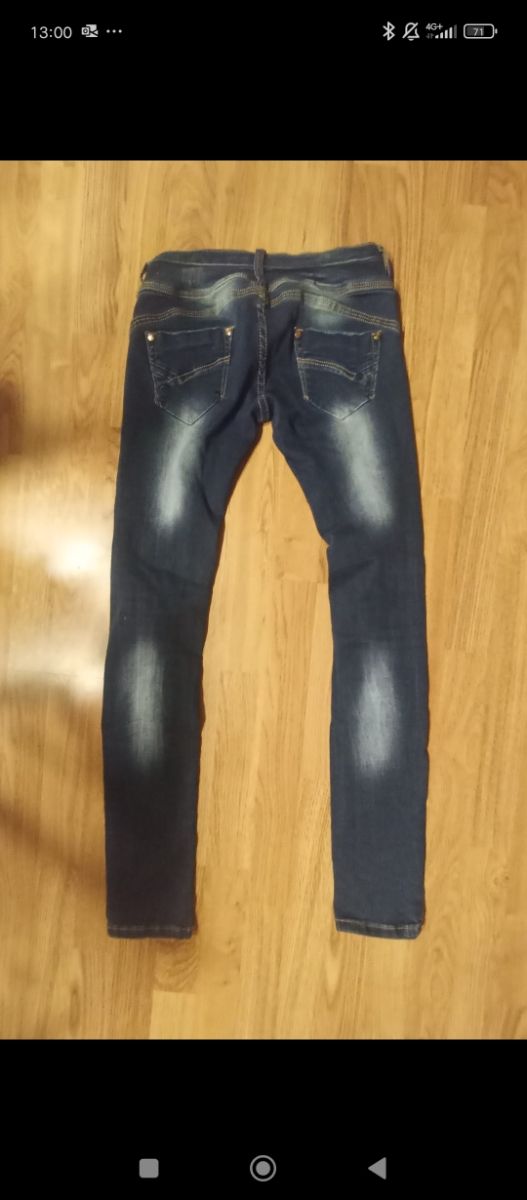 Vaqueros rotos ajustados azules