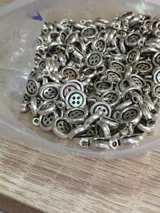 Colgantes botón plata - 100uds