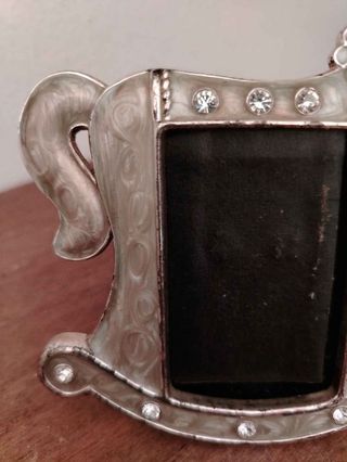 Portafoto particolare in metallo e madreperla