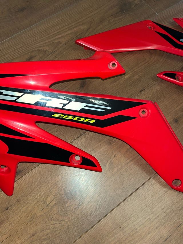 Tapas laterales deposito CRF250R
