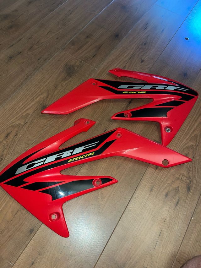 Tapas laterales deposito CRF250R