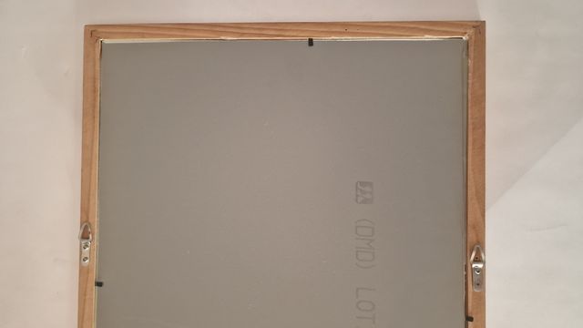 Specchio IKEA RAM marrone in legno.