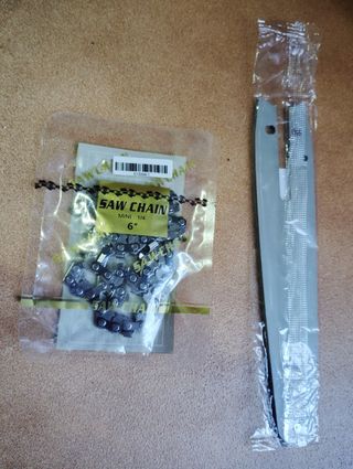 Cadena y espadín de motosierra de batería a estren