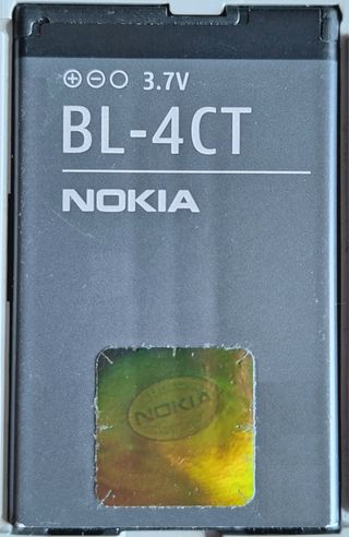 Móvil Nokia 7230 con cargador y batería