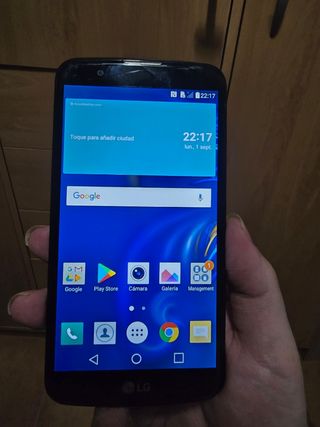 LG teléfono móvil negro, funciona perfectamente