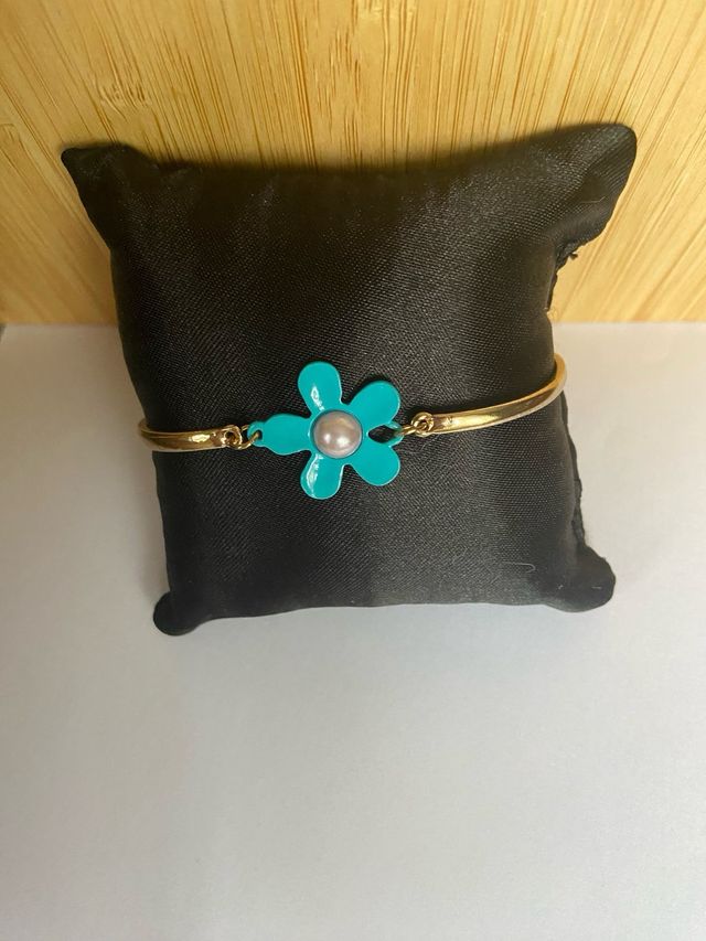 Pulsera dorada flor turquesa