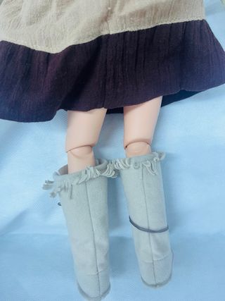 Muñeca articulada con trenzas