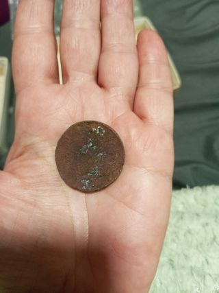 Moneda antigua de cobre