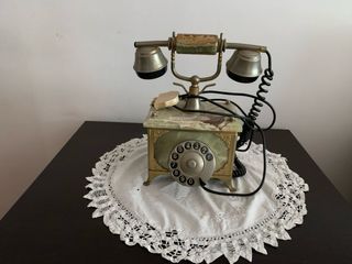 Teléfono antiguo mármol dorado