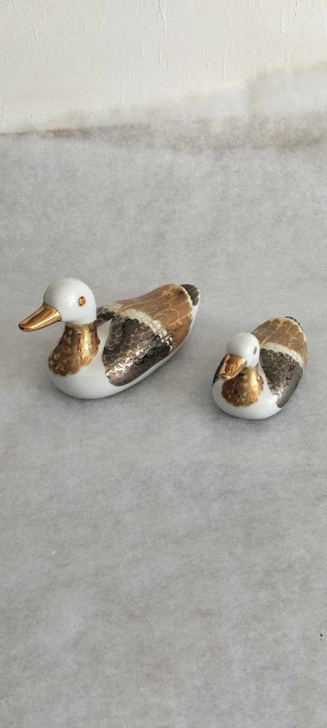 Pareja patos porcelana dorada