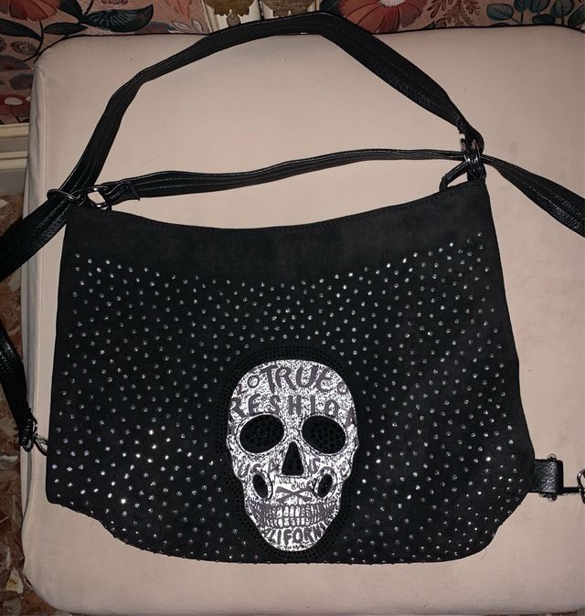 Bolso negro-tachuelas