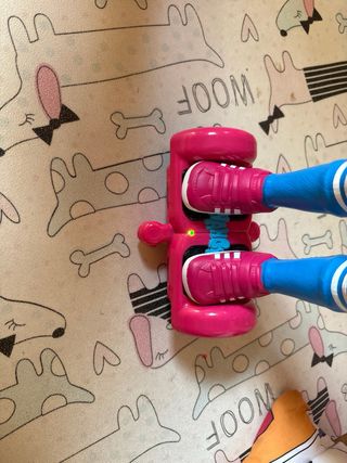 Muñeca Nancy con patinete