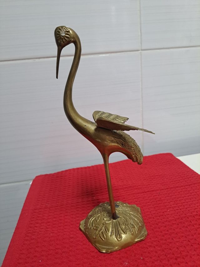 Figura bronce grulla