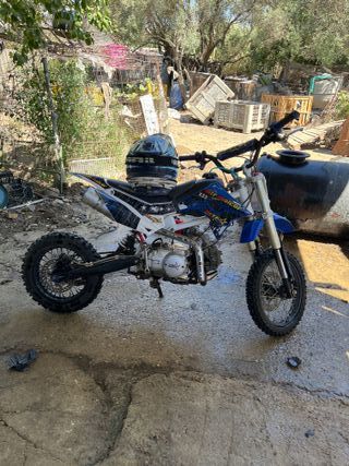 Pit bike 125cc y casco