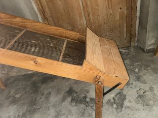 Trilladora antigua de madera