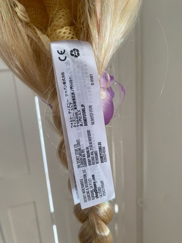 Peluca Rapunzel original Disney pelo trenzado
