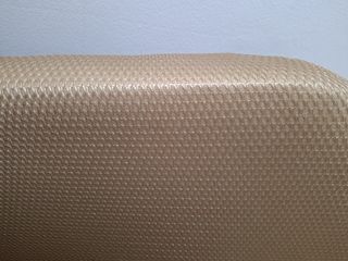 Base tapizada negra y beige