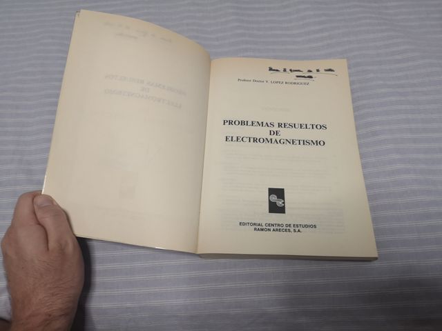 Problemas resueltos de electromagnetismo