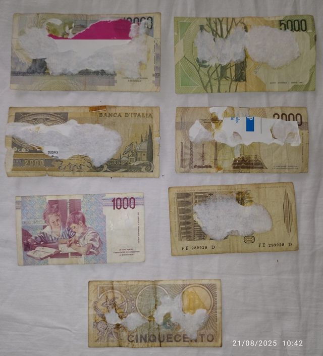 Banconote e monete italiane antiche.