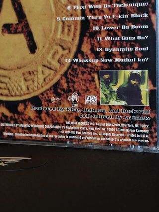 CD Artifacts - Between A Rock