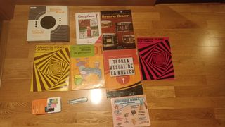 Libros y material de percusión + baquetas