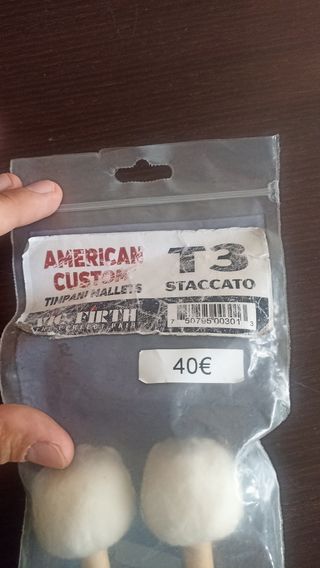 Libros y material de percusión + baquetas